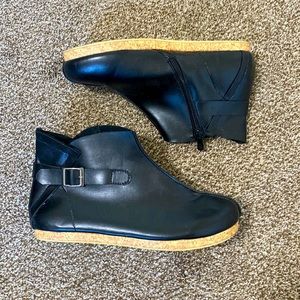 Black, side-buckle, zip ankle boots